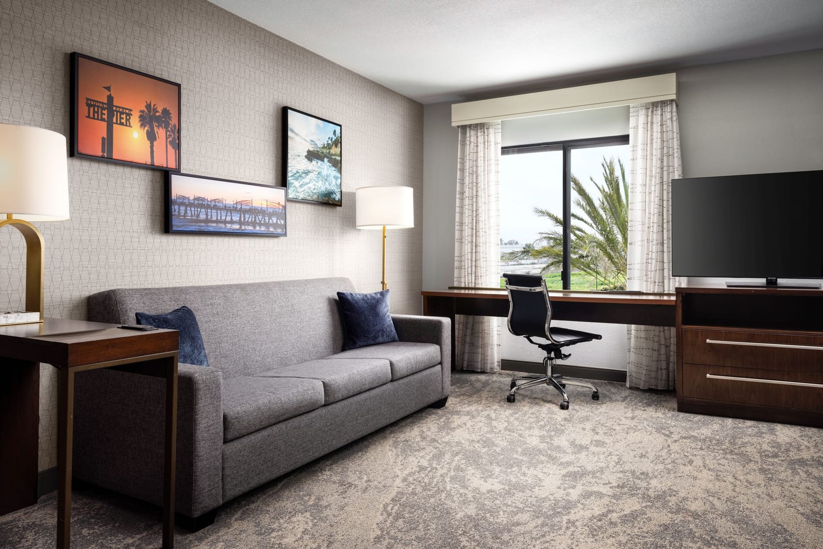 One-bedroom king suite living area with a full kitchen at Residence Inn by Marriott Los Angeles Redondo Beach